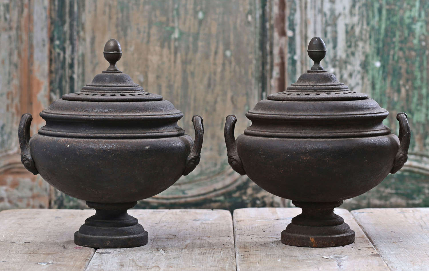 Pair of English Regency cast iron incense burners